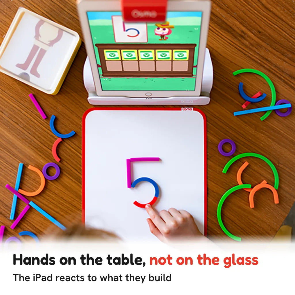 A child building the number five with silicone Sticks and Rings