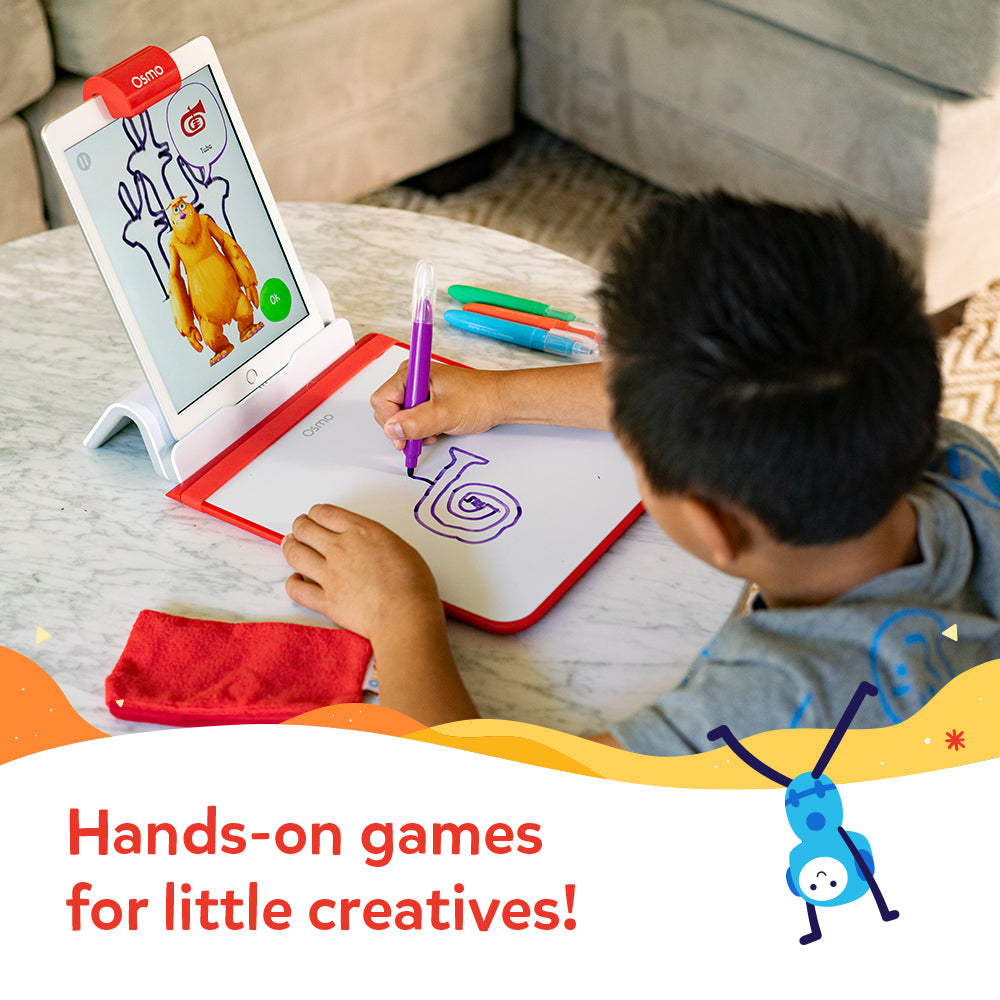 Hands-on games for little creatives: a boy drawing a spiral on the Creative Board while Mo the monster reacts on the iPad